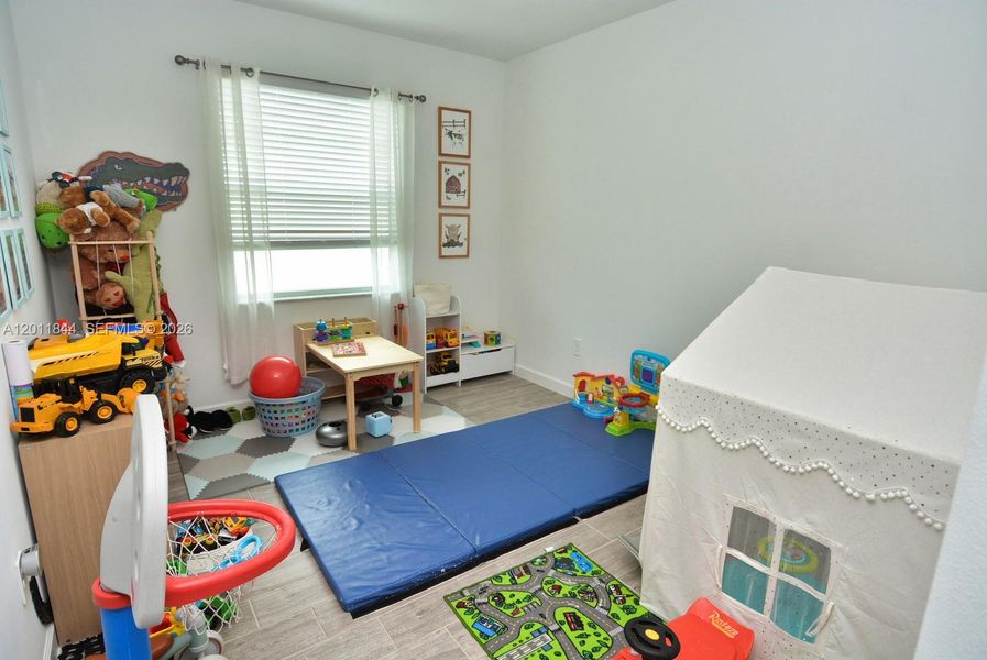 Furnished interior view inside a new home in Central Park, Port St. Lucie (Image 36).