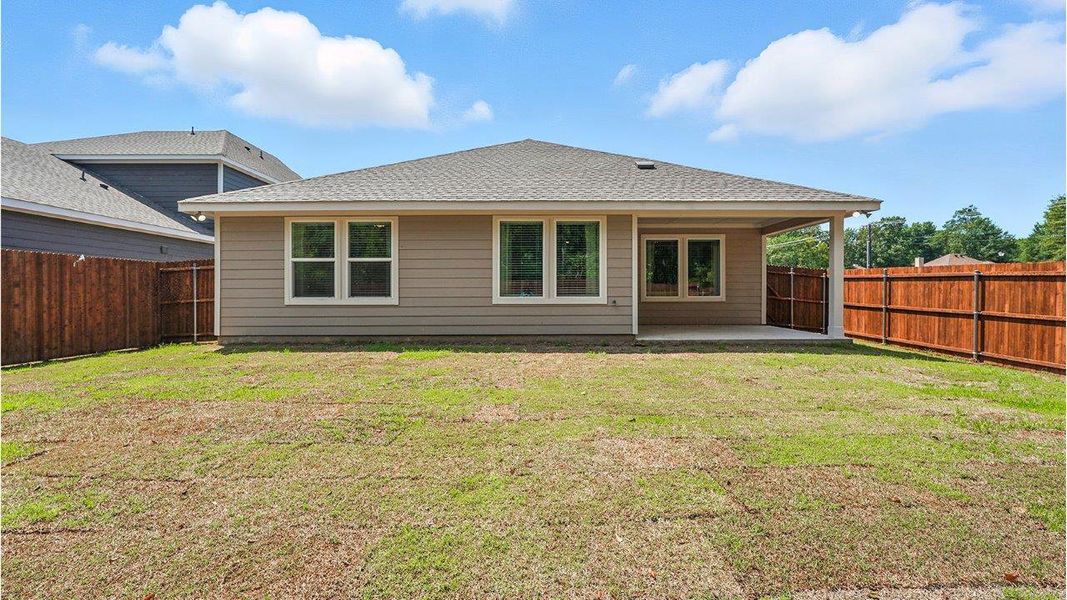 Representative exterior photo of a completed home built from the Huntsville by D.R. Horton in The Reserve at Timber Creek, Lindale, TX (Image 23).