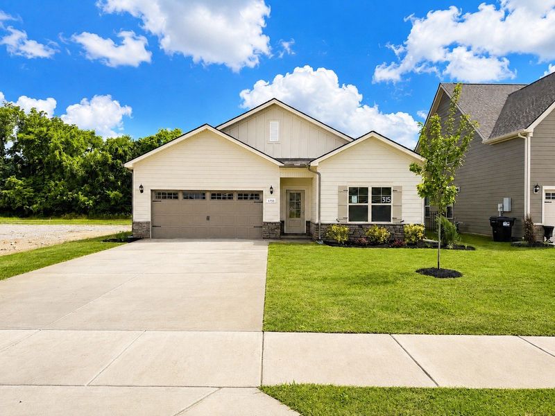Front exterior of a new home in Salem Landing, Rockvale, TN, highlighting curb appeal (Image 1). Front exterior of a new home in Salem Landing, Rockvale, TN, highlighting curb appeal (Image 1).