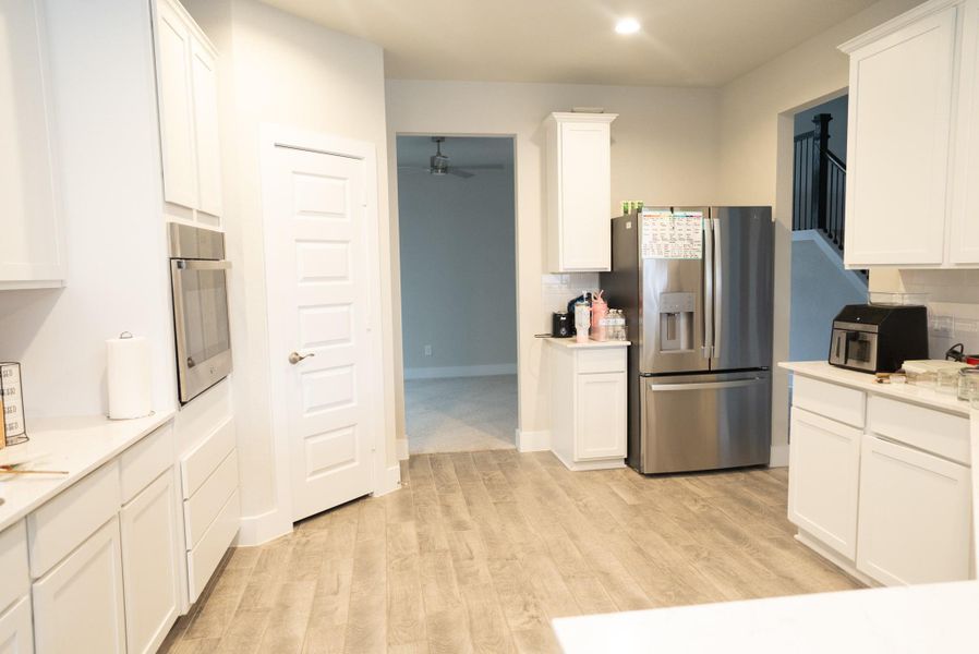Furnished interior view inside a new home in Sunterra, Katy (Image 18).