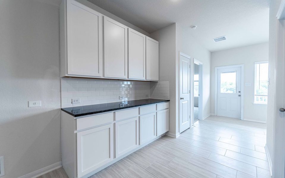 Furnished interior view inside a new home in Hunter's Ranch, San Antonio (Image 5).