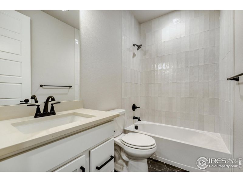 Furnished interior view inside a new home in Barefoot Lakes, Firestone (Image 11).