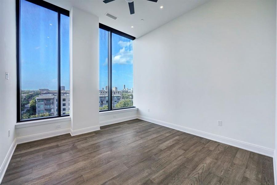 The well-appointed secondary bedroom suite enjoys northern views, a ceiling fan and an extra-large walk-in closet.