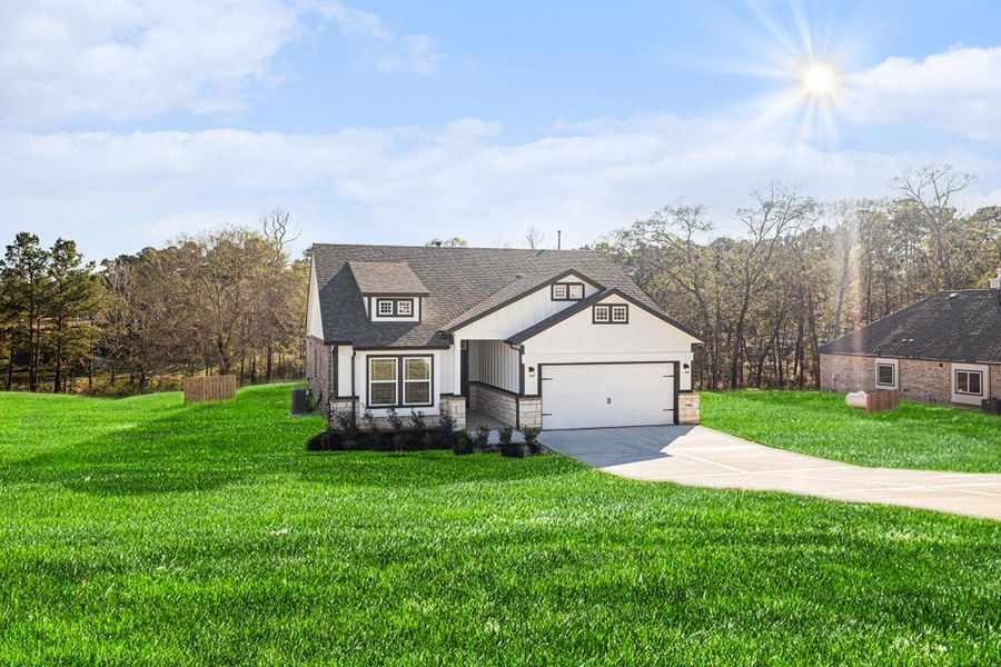 Front exterior of a new home in Rose Hill Estates, Willis, TX, highlighting curb appeal (Image 20).