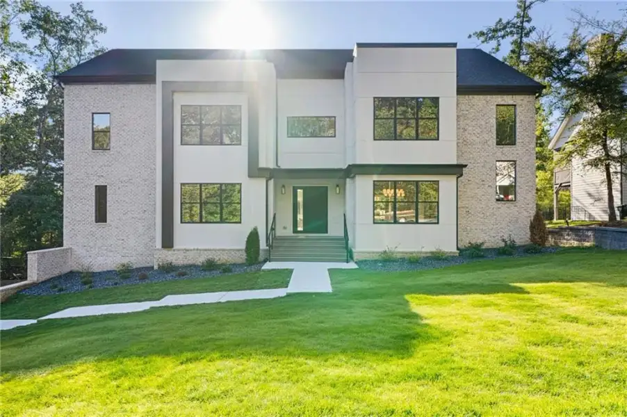Front exterior of a new home in , Mableton, GA, highlighting curb appeal (Image 2). Front exterior of a new home in , Mableton, GA, highlighting curb appeal (Image 2).