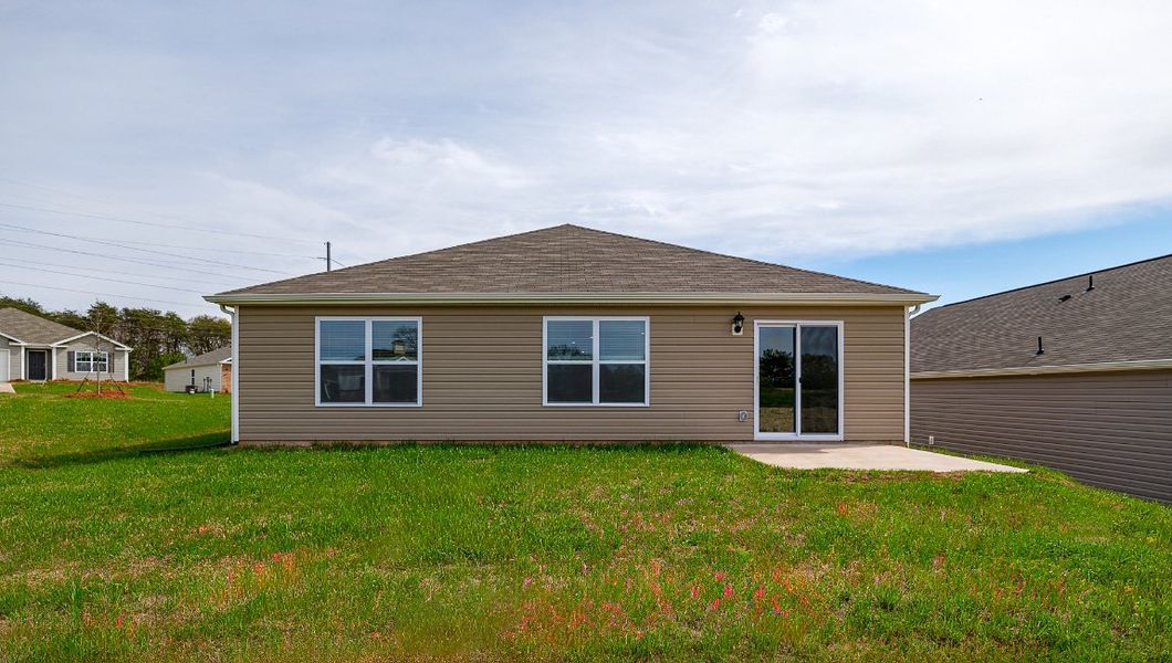 Front exterior of a new home in Stone Creek, Clinton, SC, highlighting curb appeal (Image 2).