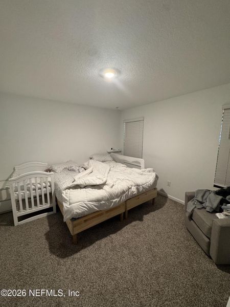 Furnished interior view inside a new home in Entrada, St. Augustine (Image 11).