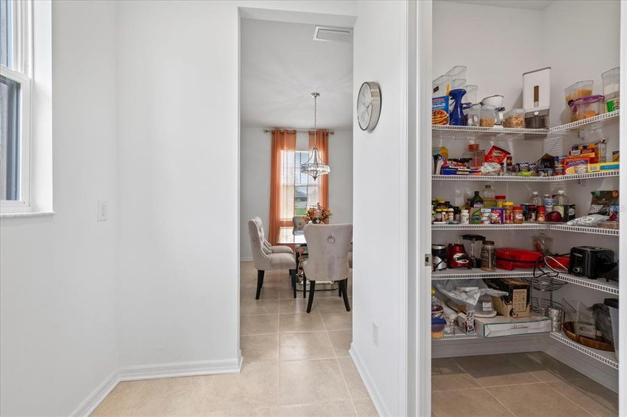 Furnished interior view inside a new home in Hilltop Point, Dade City (Image 27).