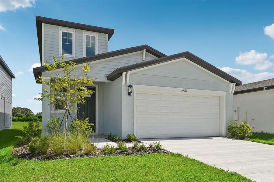 Front exterior of a new home in Salt Meadows - Premier Series, Parrish, FL, highlighting curb appeal (Image 2).