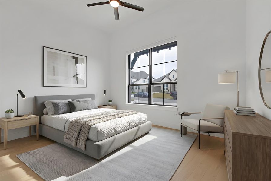 Virtually-Staged Bedroom #2 with light hardwood flooring, vaulted ceiling, and ceiling fan