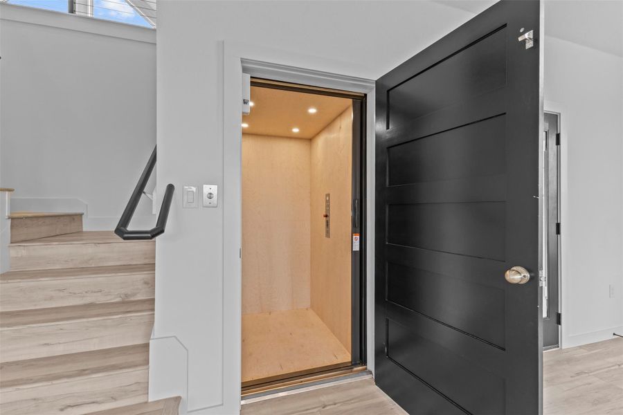 Elevator with wood finished floors