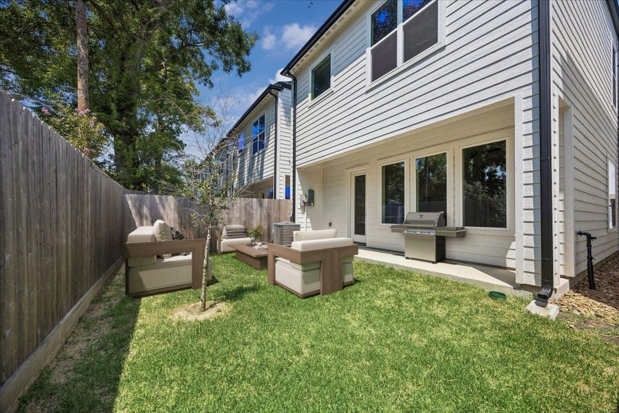 Exterior details and patio area of a home in , Houston (Image 3).