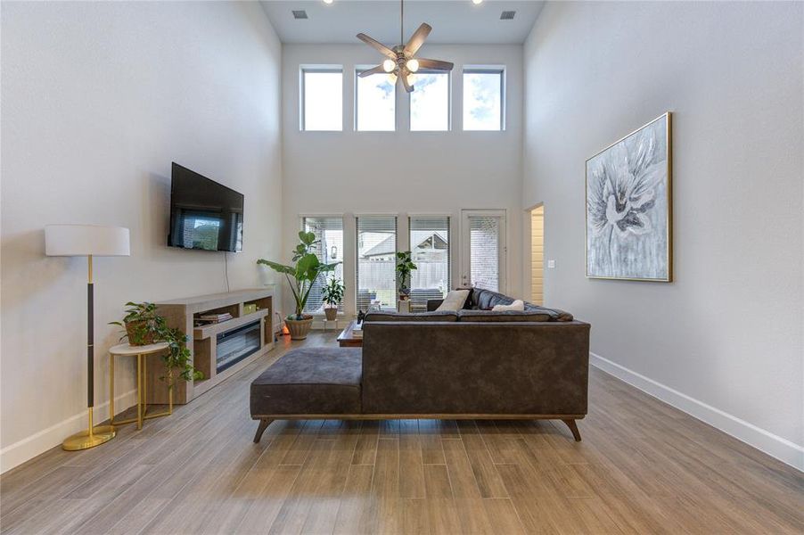 8 windows, double height ceiling living room.