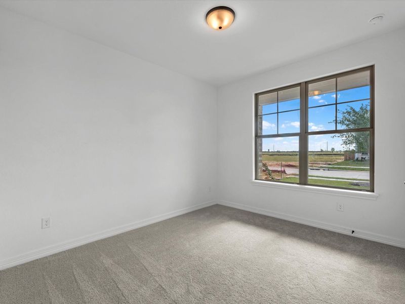 Spacious, unfurnished interior of a new home in Sunterra Lakes, Brookshire (Image 25).