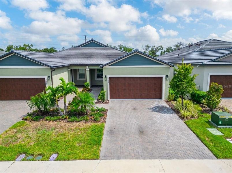 Front exterior of a new home in , Parrish, FL, highlighting curb appeal (Image 28).