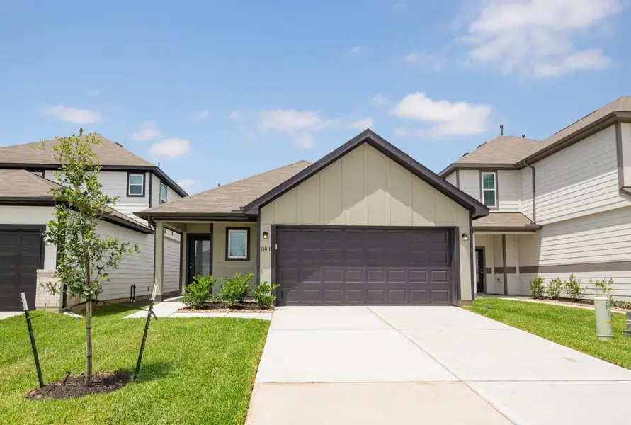 Front exterior of a new home in Bammel Oaks, Houston, TX, highlighting curb appeal (Image 11).