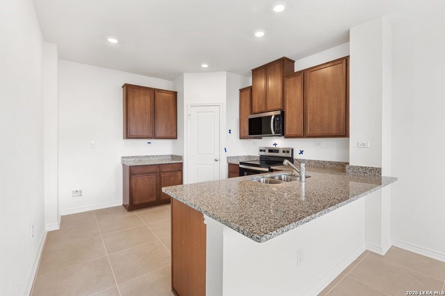 Furnished interior view inside a new home in Southton Cove, Elmendorf (Image 12).