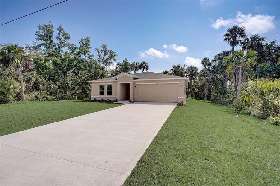 Front exterior of a new home in Citrus Springs, Citrus Springs, FL, highlighting curb appeal (Image 7).