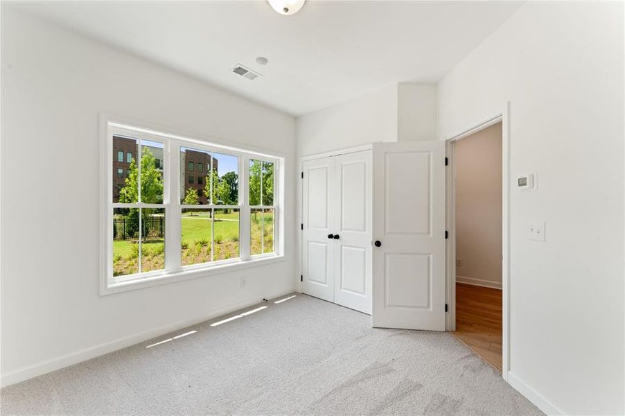 Spacious, unfurnished interior of a new home in Townes at South Main, Kennesaw (Image 11).