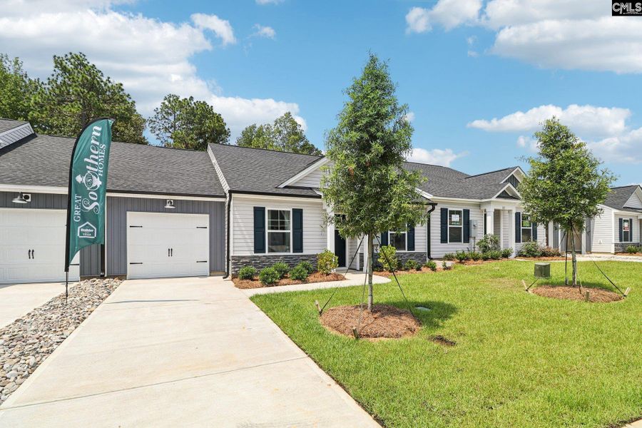 Front exterior of a new home in Piney Woods Bluff, Columbia, SC, highlighting curb appeal (Image 20). Front exterior of a new home in Piney Woods Bluff, Columbia, SC, highlighting curb appeal (Image 20).