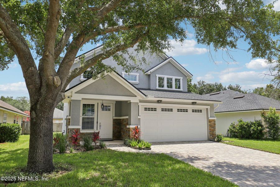 Front exterior of a new home in , Orange Park, FL, highlighting curb appeal (Image 30). Front exterior of a new home in , Orange Park, FL, highlighting curb appeal (Image 30).