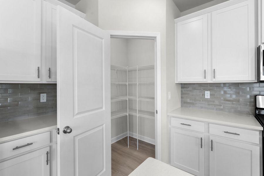 Furnished interior view inside a new home in Cypress Ridge - The Boardwalk Series, Longs (Image 12).