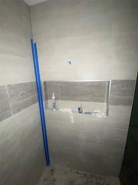 Full bathroom with a stall shower Full bathroom with a stall shower