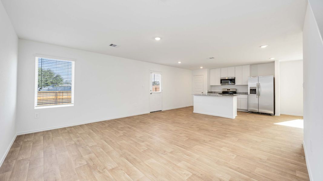 Representative unfurnished interior of a home built from the Franklin by D.R. Horton in Legacy Village, Houston (Image 10).