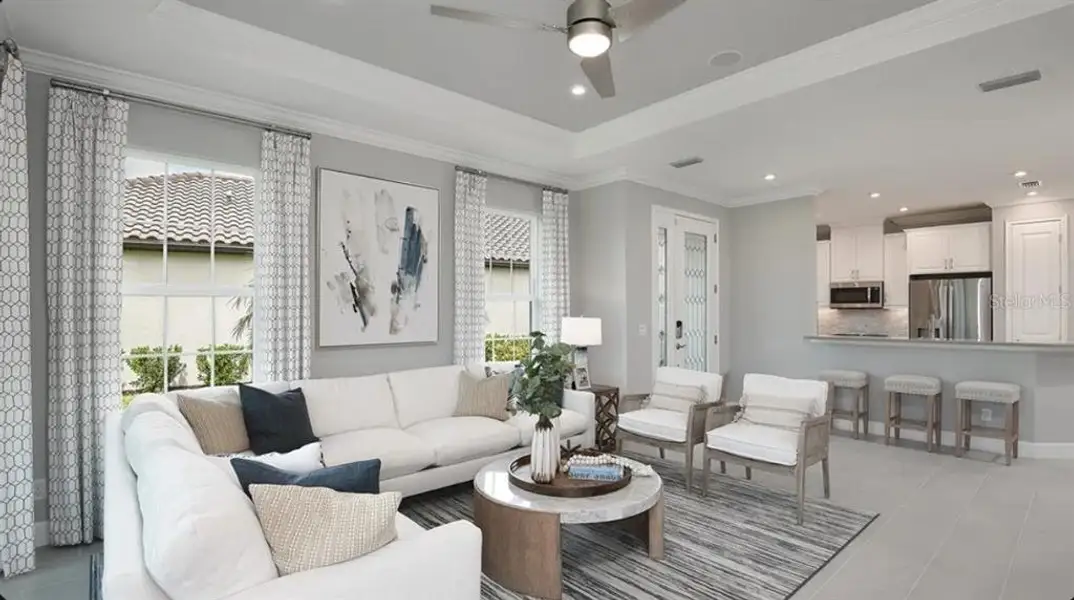 Furnished interior view inside a new home in Esplanade at Wellen Park, Englewood (Image 7).