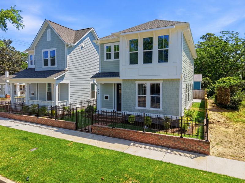 Representative exterior photo of a completed home built from the The Remington by RobuckHomes in Downtown Wilmington Collective, Wilmington, NC (Image 36). Representative exterior photo of a completed home built from the The Remington by RobuckHomes in Downtown Wilmington Collective, Wilmington, NC (Image 36).