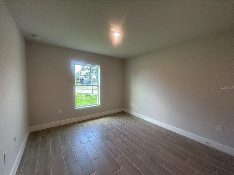 Spacious, unfurnished interior of a new home in Deep Creek, Punta Gorda (Image 23).