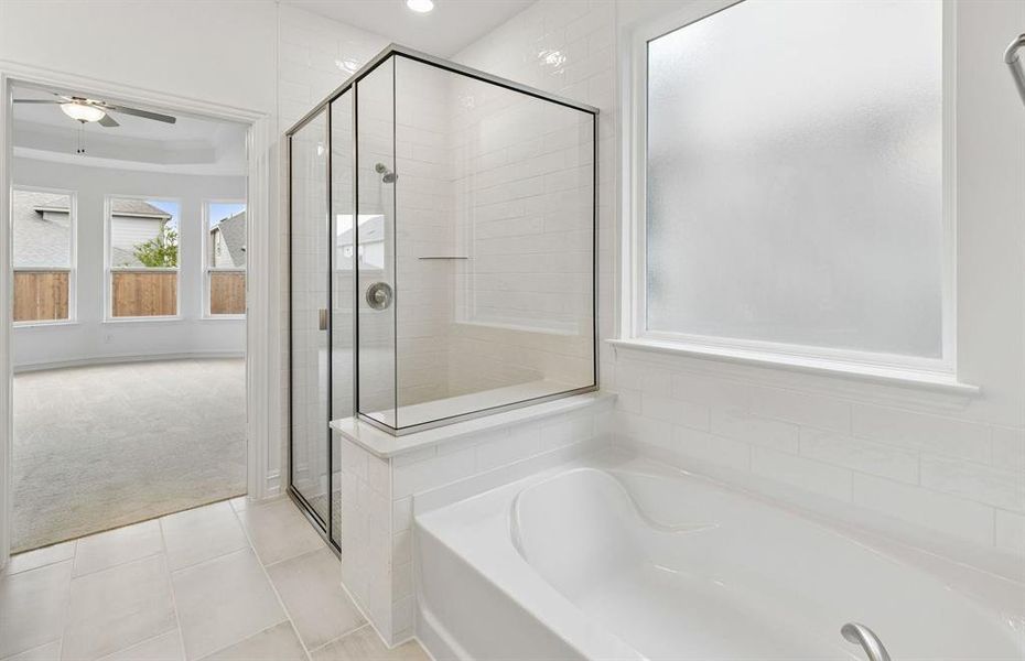 Primary bath with separate shower and tub