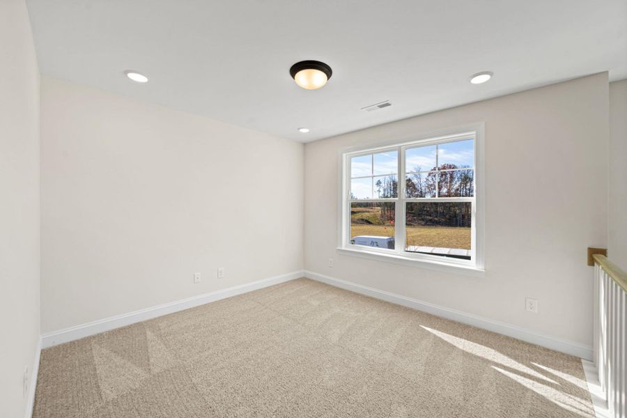 Spacious, unfurnished interior of a new home in Monterra, Kernersville (Image 31).