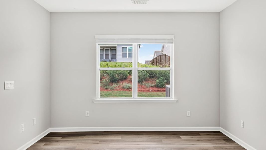 Spacious, unfurnished interior of a new home in Tanglewood Townes, Greenville (Image 21).