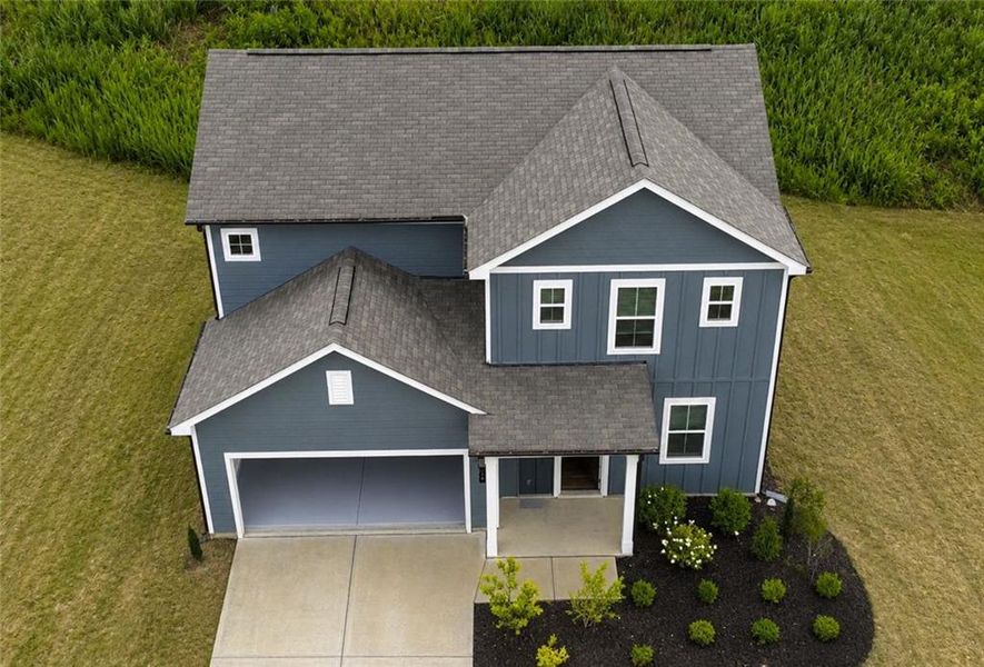 Front exterior of a new home in Alcovy Trace, Lawrenceville, GA, highlighting curb appeal (Image 22).