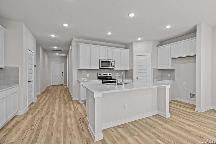 Furnished interior view inside a new home in Cinco Lakes, San Antonio (Image 3).