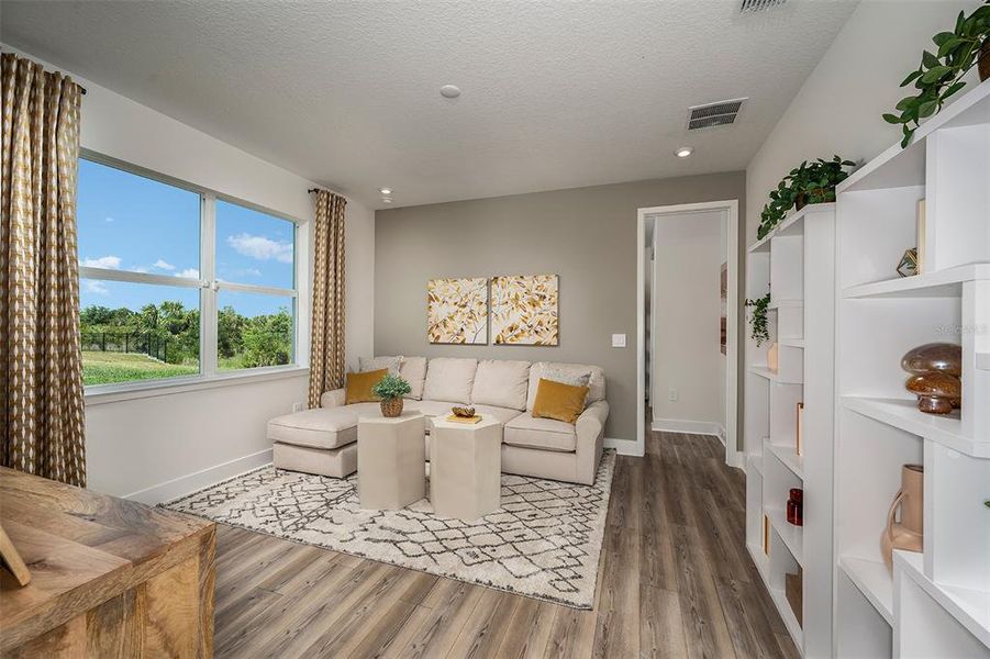 Furnished interior view inside a new home in Wellen Park, Venice (Image 9).