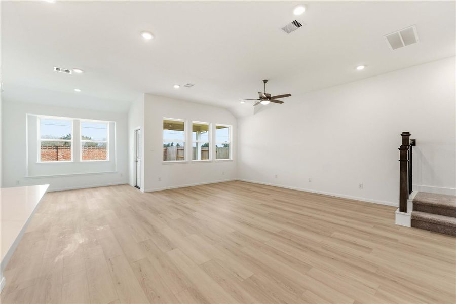 Spacious, unfurnished interior of a new home in Sunterra, Katy (Image 17).