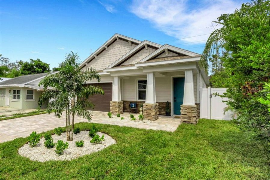 Front exterior of a new home in , Dunedin, FL, highlighting curb appeal (Image 25). Front exterior of a new home in , Dunedin, FL, highlighting curb appeal (Image 25).