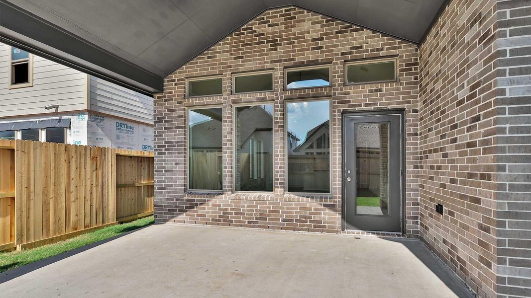 Front exterior of a new home in Candela 40', Richmond, TX, highlighting curb appeal (Image 9). Front exterior of a new home in Candela 40', Richmond, TX, highlighting curb appeal (Image 9).