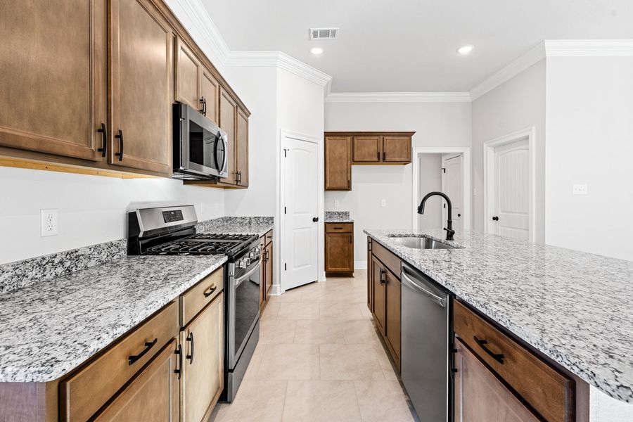 Furnished interior view inside a new home in The Bluffs at Lafayette, Freeport (Image 6). Furnished interior view inside a new home in The Bluffs at Lafayette, Freeport (Image 6).