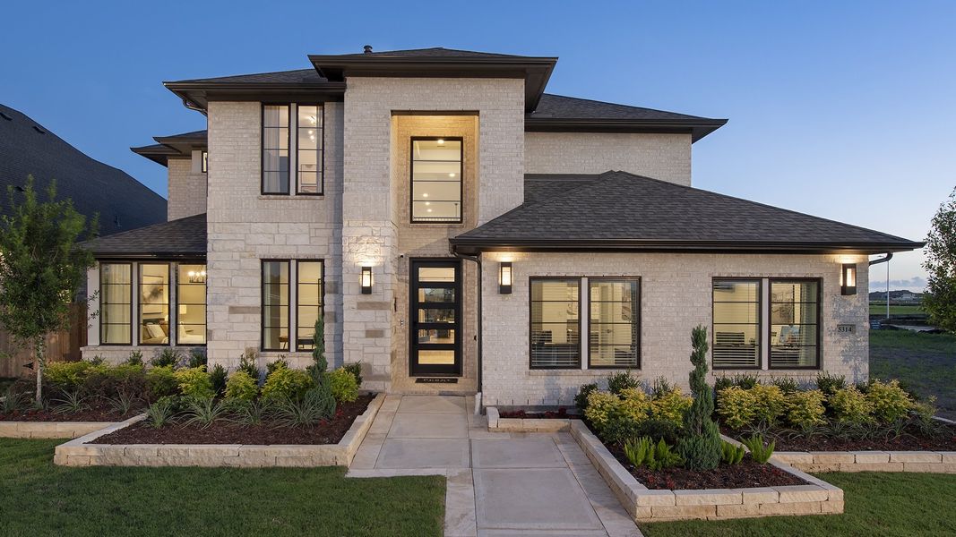 Front exterior of a new home in Santa Rita Ranch - Eldorado, Liberty Hill, TX, highlighting curb appeal (Image 24).