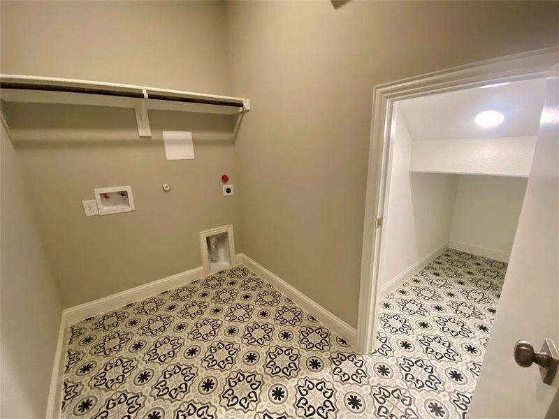 Look at the designer ceramic tile floor and extra storage space in utility room? Look at the designer ceramic tile floor and extra storage space in utility room?