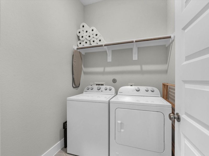 Utility located on first floor at garage entry. Utility located on first floor at garage entry.