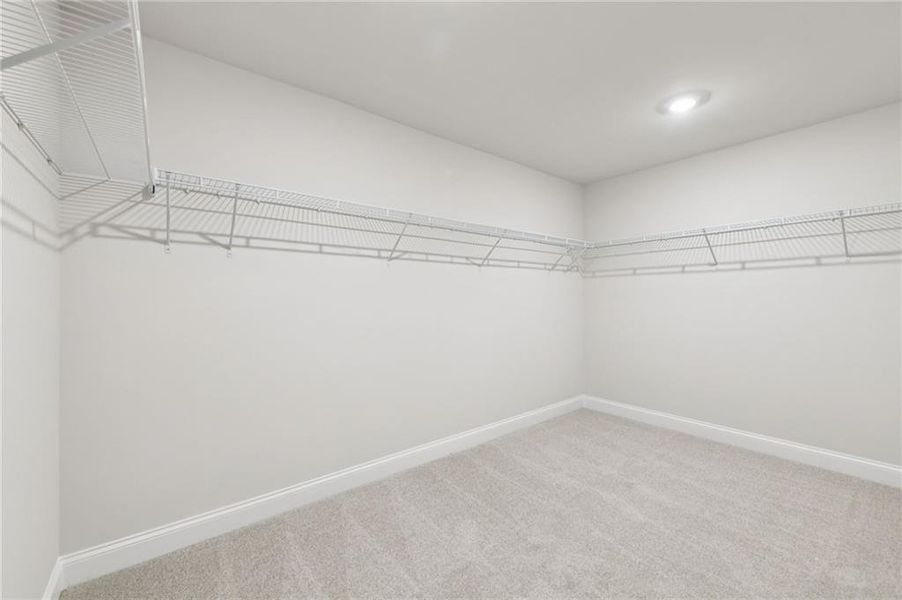 Spacious, unfurnished interior of a new home in Vines at Mill Creek - Estate Series, Braselton (Image 42).