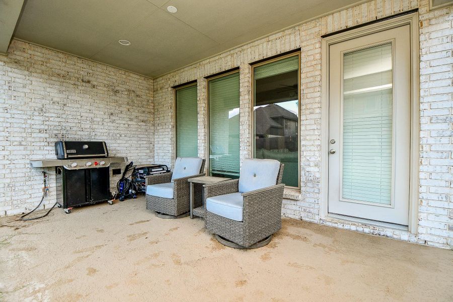 Exterior details and patio area of a home in Harvest Green 45', Richmond (Image 3). Exterior details and patio area of a home in Harvest Green 45', Richmond (Image 3).