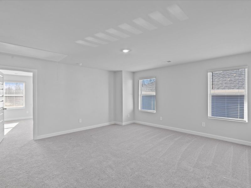 Spacious, unfurnished interior of a new home in The Farm at Wells Creek - Signature Collection, Gray Court (Image 12).