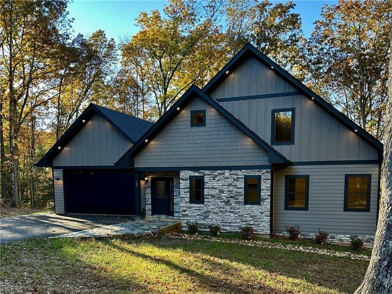 Front exterior of a new home in , Talking Rock, GA, highlighting curb appeal (Image 1).