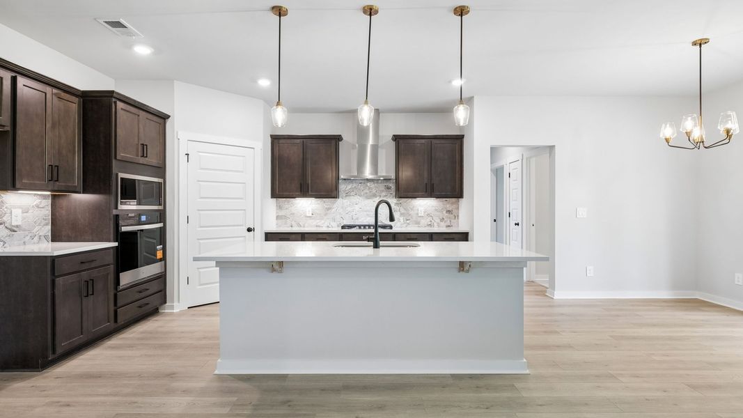 Representative furnished interior of a home built from the Ansley by D.R. Horton in Harvest Point, Spring Hill (Image 11).