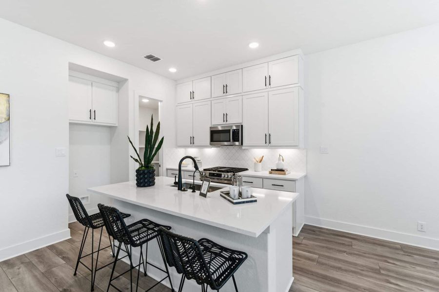 Representative furnished interior of a home built from the Balder – HD by Chesmar Homes in Prominence, San Antonio (Image 6).